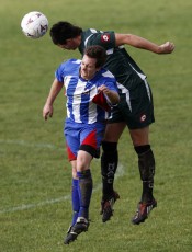 Ngaruawahia's Owen Ivins gets up above Papakura's Peter Street to win the ball. Football NRFL Northern Region Football League 1st Division Papakura City FC v Ngaruawahia AFC Saturday 18th July 2009. Photo Credit: Shane Wenzlick