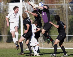 FHM come close before Ngaruawahia's Alex Carr gets his face between the ball and the goal. NRFL Northern Region Football League Premier Division, Forrest Hill Milford AFC v Ngaruawahia Utd AFC, Becroft Park, Forrest Hill, Saturday 10th July 2010. Photo: Shane Wenzlick
