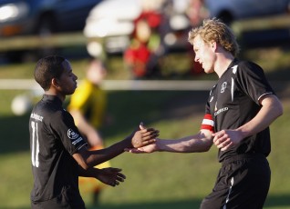 FHM's Byron Paulus celebrates scoring from a penalty with Mikael Munday (right). NRFL Northern Region Football League Premier Division, Forrest Hill Milford AFC v Ngaruawahia Utd AFC, Becroft Park, Forrest Hill, Saturday 10th July 2010. Photo: Shane Wenzlick