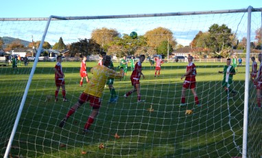 Matty Williams sees his 25-meter free kick hit the underside of the bar and bounce out.